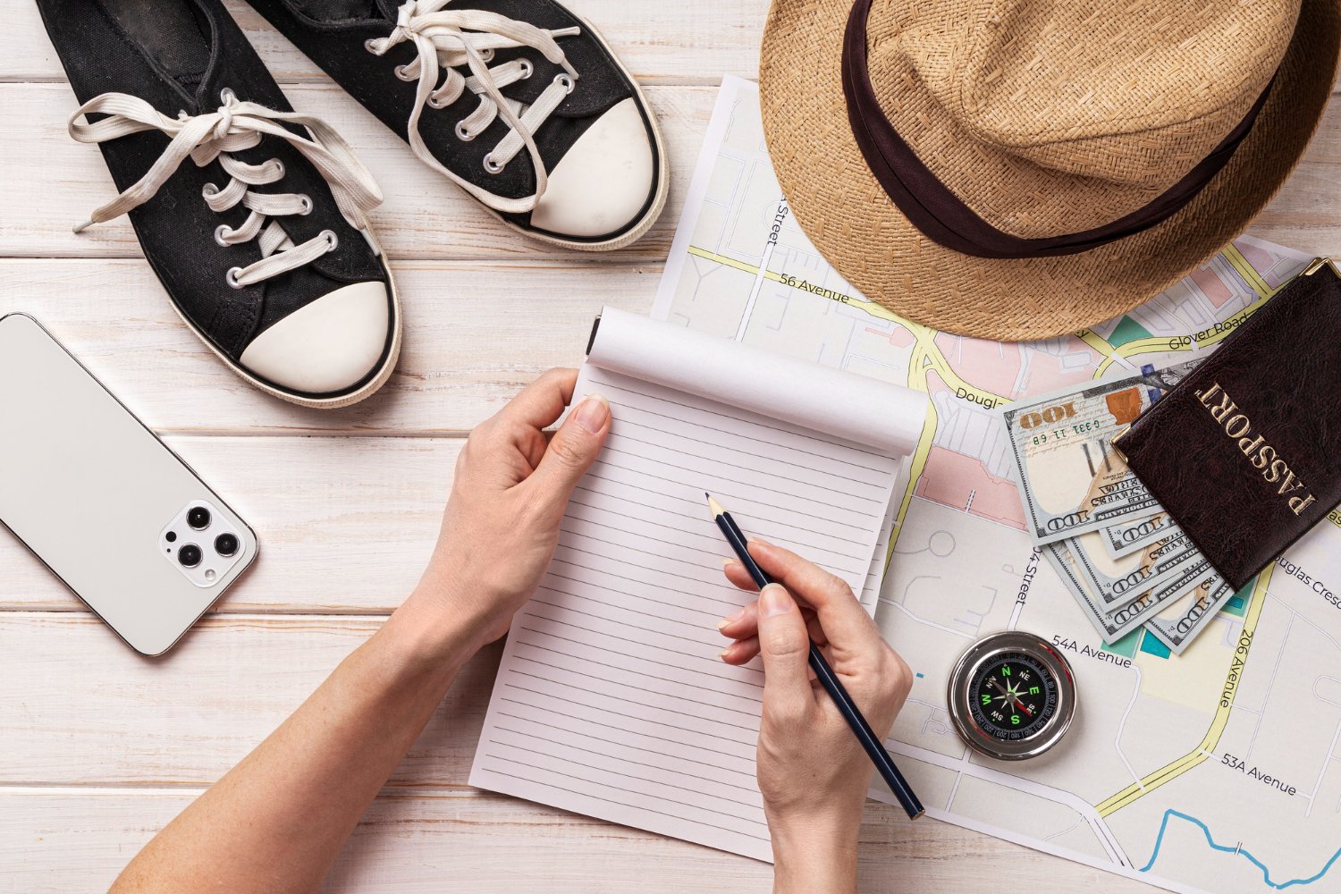 sneakers, straw hat, and other products for budget travel hacks.
