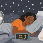 Woman sleeping in a cozy bed at night.