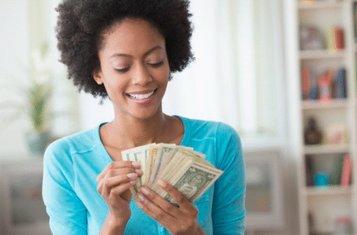 Money mindset woman counting cash.